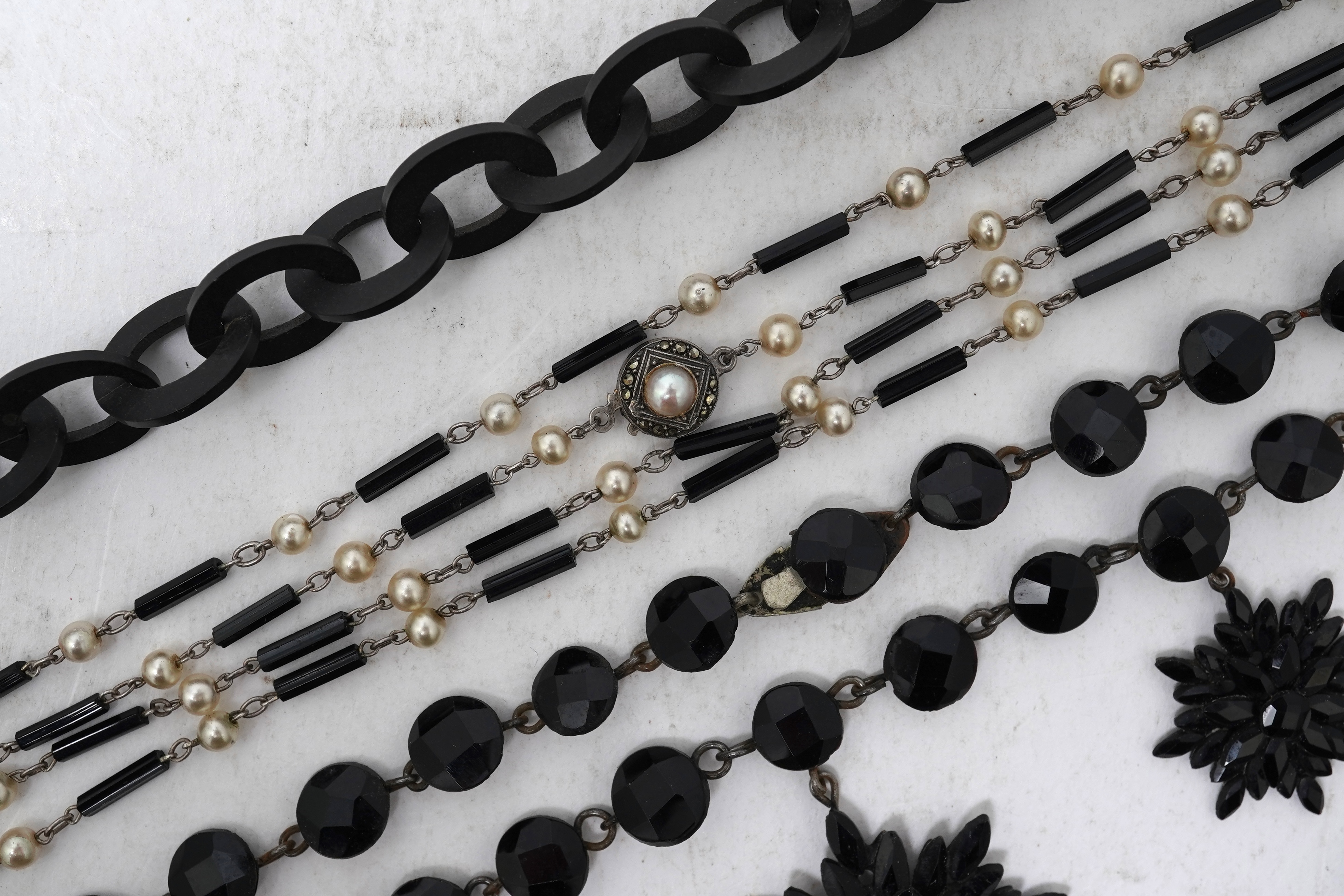 A group of simulant jet jewels, 19th century/early 20th century